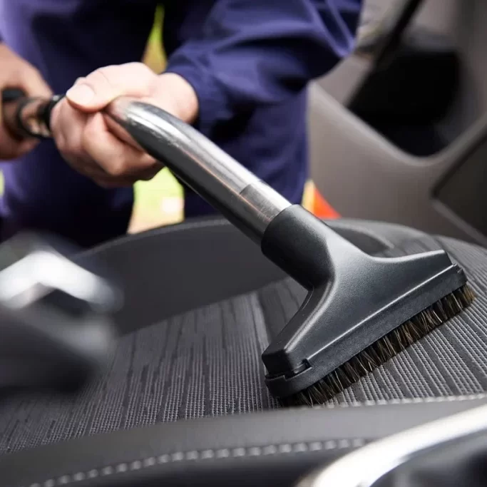 vacuuming-car-seat-GettyImages-481395168